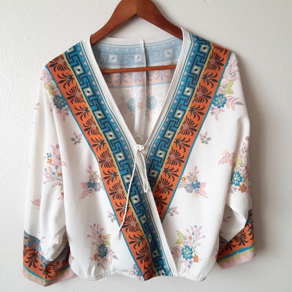 Super cute floral boho style blouse.